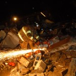 Firefighters cut into steel to get to students.