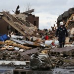 Rescue and safety teams assess damage. Photo by Stephanie Schroeder.