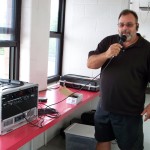 Athletic Director Louis James tests the system from the press box Athletic Director Louis James