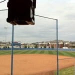 A Technomad Noho Loudspeaker Suspended from Yoke Mount at MTSU Softball Press Box